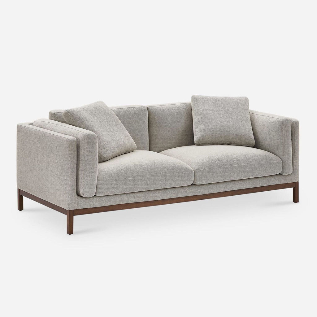 Modern Castlery loveseat in soft beige, featuring clean lines, deep seating, and a sturdy wooden frame.