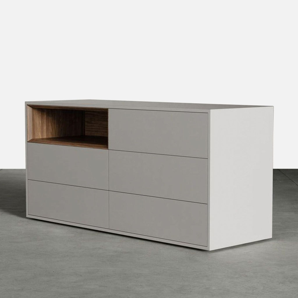 Contemporary Modloft dresser in matte white, highlighted by a wood accent and ample drawer space.