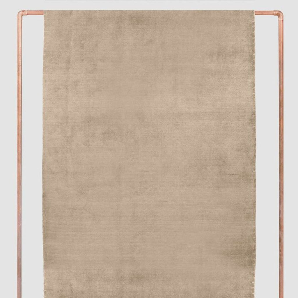 Durable, easy-care handwoven rug by The Citizenry in a minimalist style, ideal for modern and classic rooms.