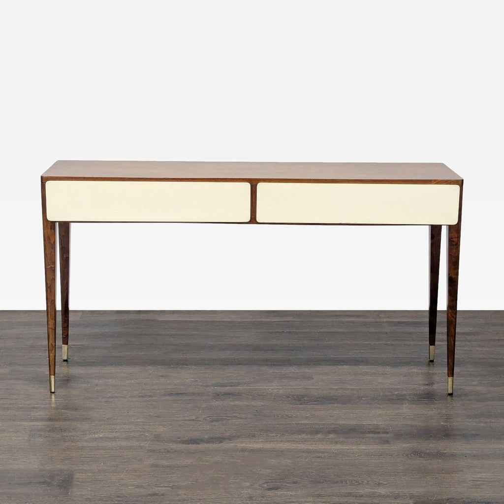 Mid-century console table with two white-front drawers, warm wood finish, and brass-accented tapered legs.
