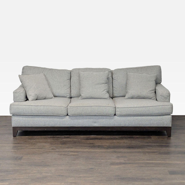Ethan Allen 3-seat sofa in modern gray fabric with four matching cushions and sturdy wooden base.  