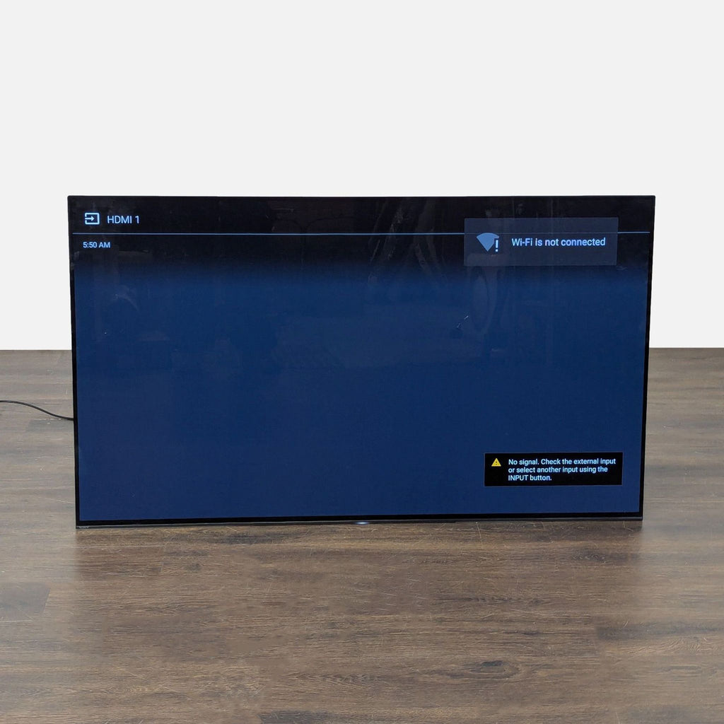 Front view of a Sony 55-inch Wi-Fi Smart TV with HDMI ports, showing clean display, no remote or stand.  