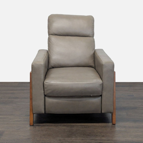 Abbyson lounge chair with smooth leather, wood frame, and cushioned seat for stylish comfort.  
