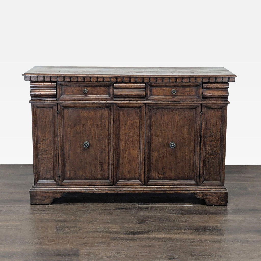 Antiqued walnut credenza by Formations featuring five drawers, two paneled doors, and decorative molding.  