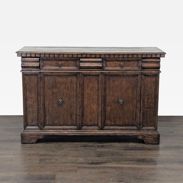 Antiqued walnut credenza by Formations featuring five drawers, two paneled doors, and decorative molding.  