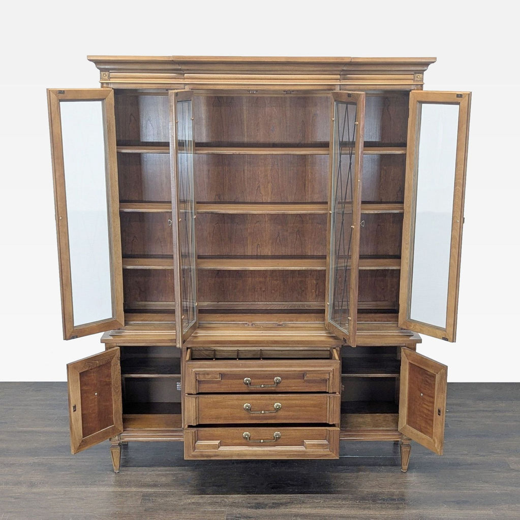 Italian Mediterranean style Thomasville hutch from the 1960s featuring glass cabinet doors and three drawers.