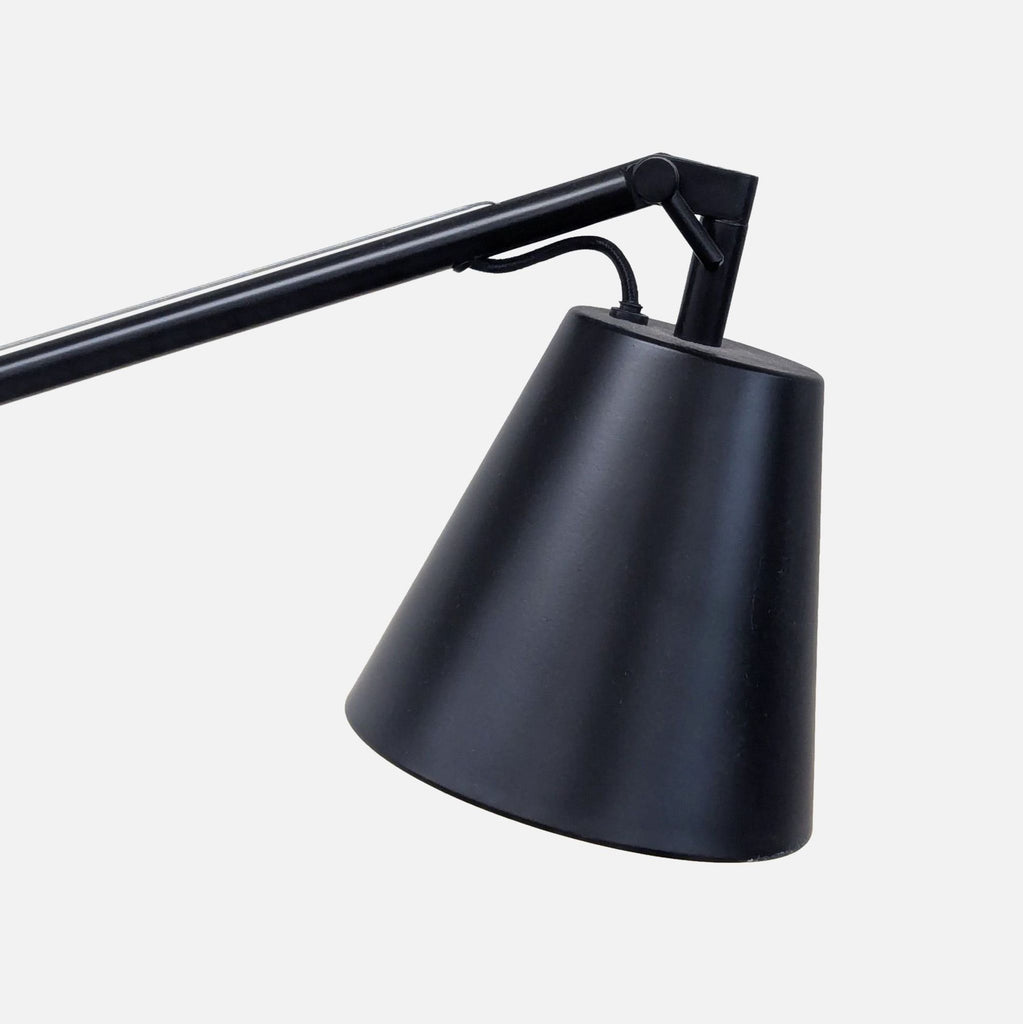 Sleek EQ3 floor lamp with adjustable black metal arm and sturdy concrete base, ideal for stylish interiors.