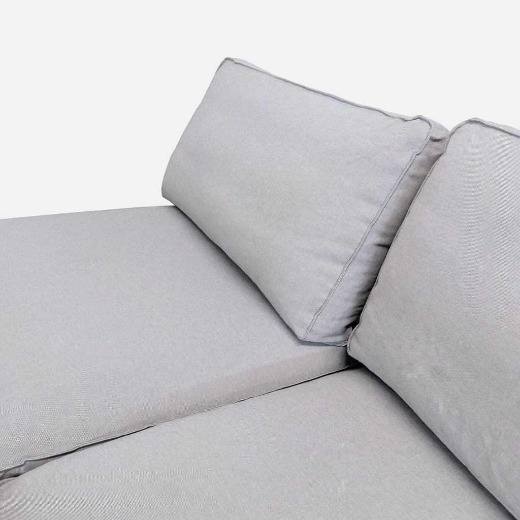 Modern light gray sectional by Ikea, fits three people and complements many home decor styles.