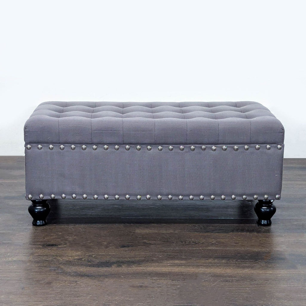 1. Marshall’s button tufted ottoman with nailhead trim, ideal for seating or decor in the Stools, Ottomans & Benches category.  
