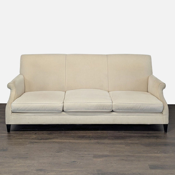 Restoration Hardware 3-seat sofa in cream fabric with rolled arms and plush back cushions, gently used condition.