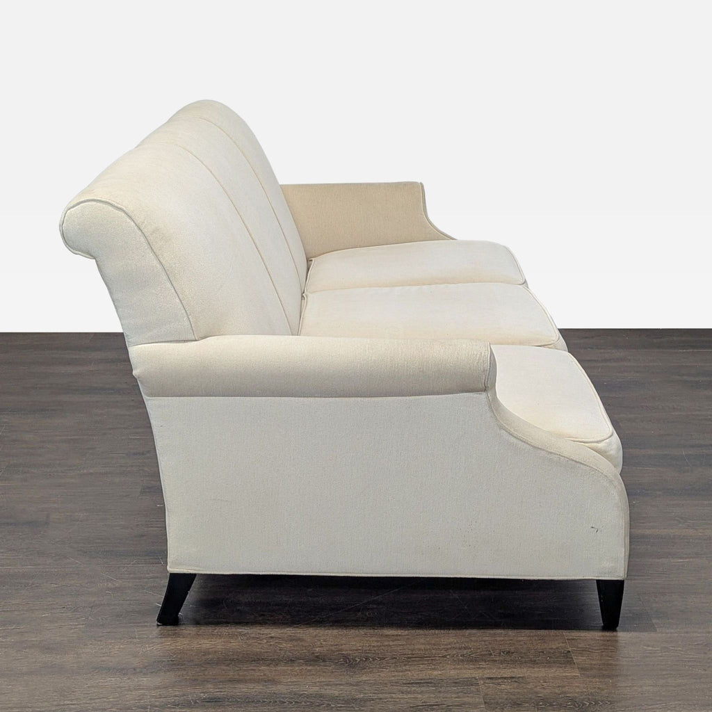 1. Modern 3-seat sofa from Restoration Hardware with plush cushions in a minimalist living room.