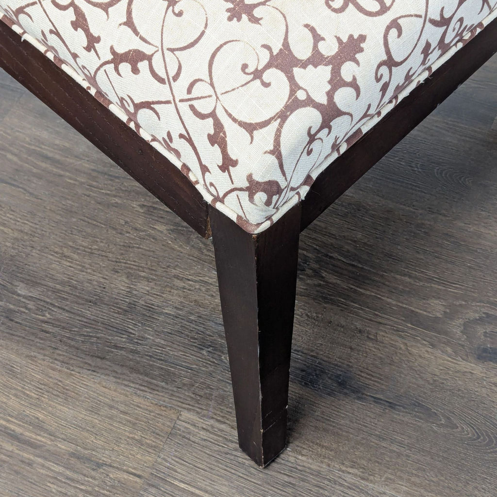 Elegant Lounge Chair with Patterned Upholstery and Wooden Frame