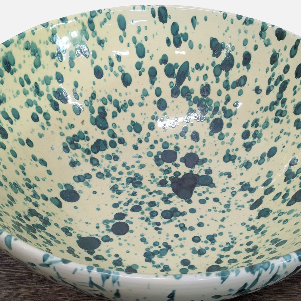 Ceramiche Nicola Fasano artisan dishware: cream bowl featuring bold green splatter accents, ideal for pasta or décor.