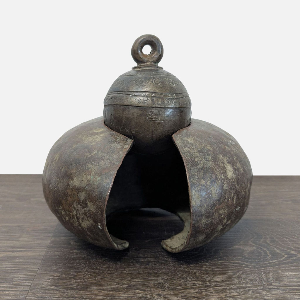 Large cast bronze livestock bell with engraved collar and rich patina, featuring loop and original clapper.