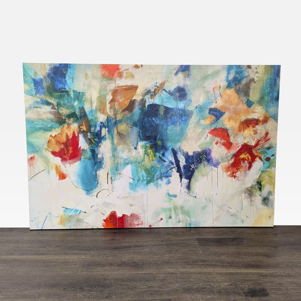 Colorful abstract world map art with bold blue, aqua, ochre, and coral brushstrokes on canvas.