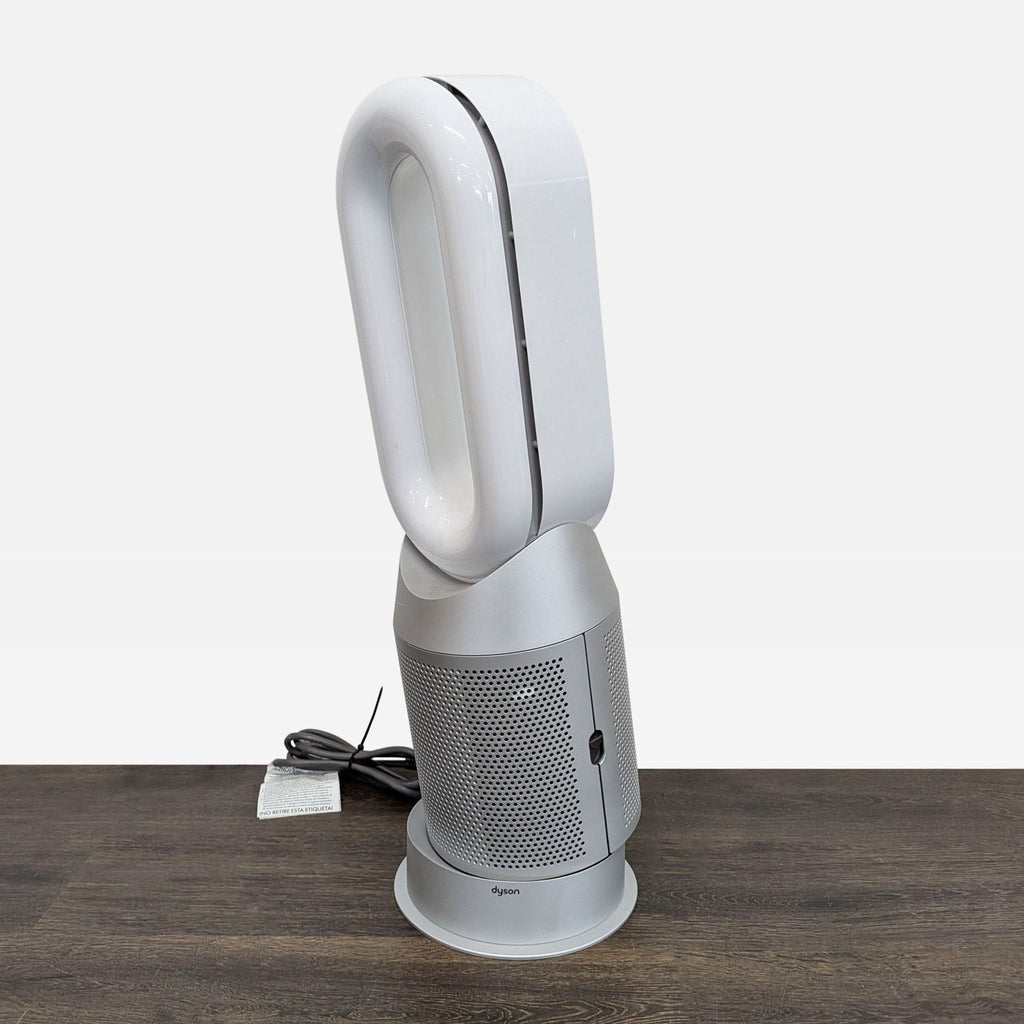 Bladeless Dyson air purifier/heater/fan in white and silver, ideal for improving comfort and air quality indoors.