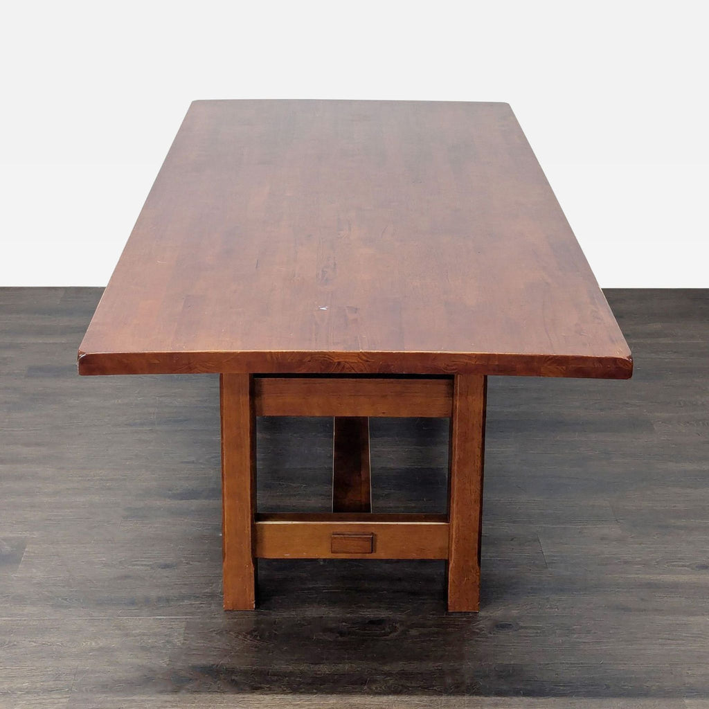 Six-person brown wood dining set, ladder-back chairs with tan cushions, ideal for family meals and gatherings.