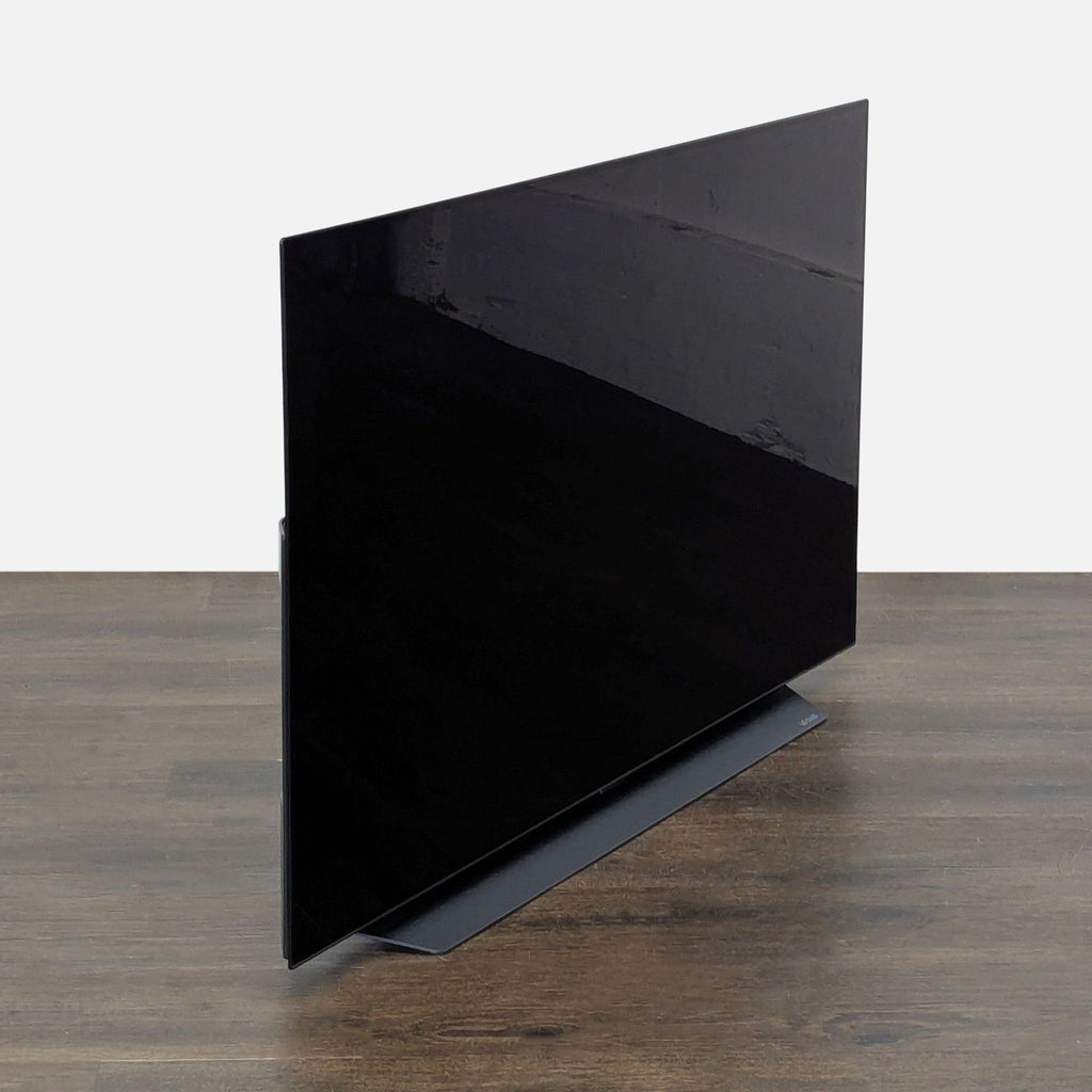 LG smart TV in great condition, offering vibrant 4K visuals and a minimal profile that fits any room décor.