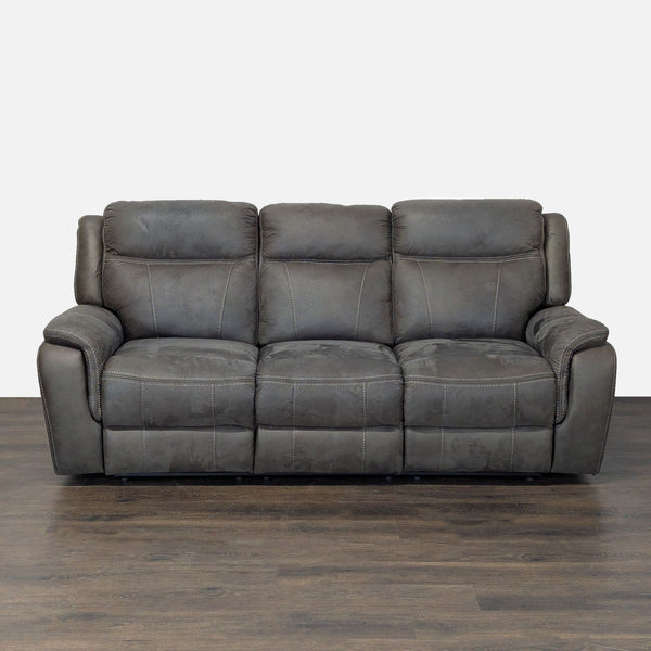 3-seat leather sofa with reclining ends, plush cushions, and padded armrests for extra comfort and durability.