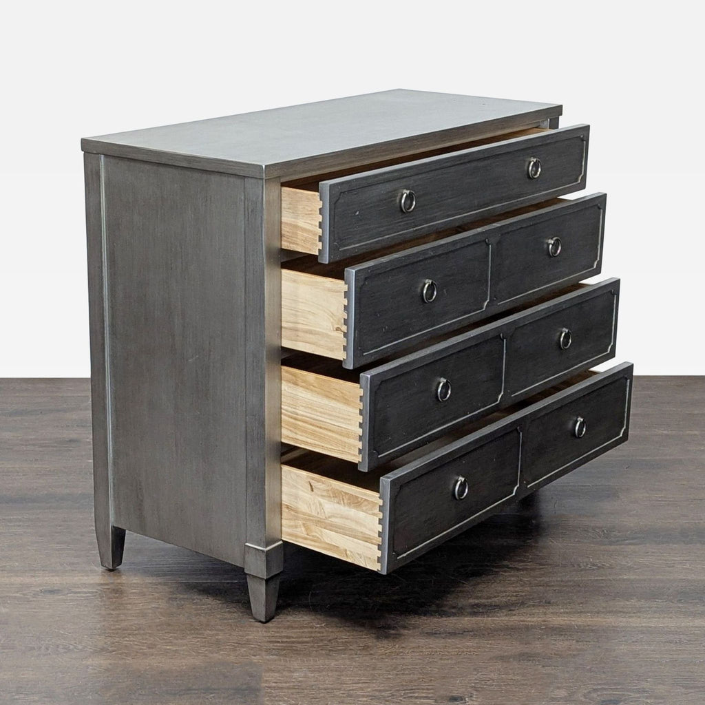 Gray four-drawer dresser by Restoration Hardware, sturdy and versatile for bedroom or living space storage.  