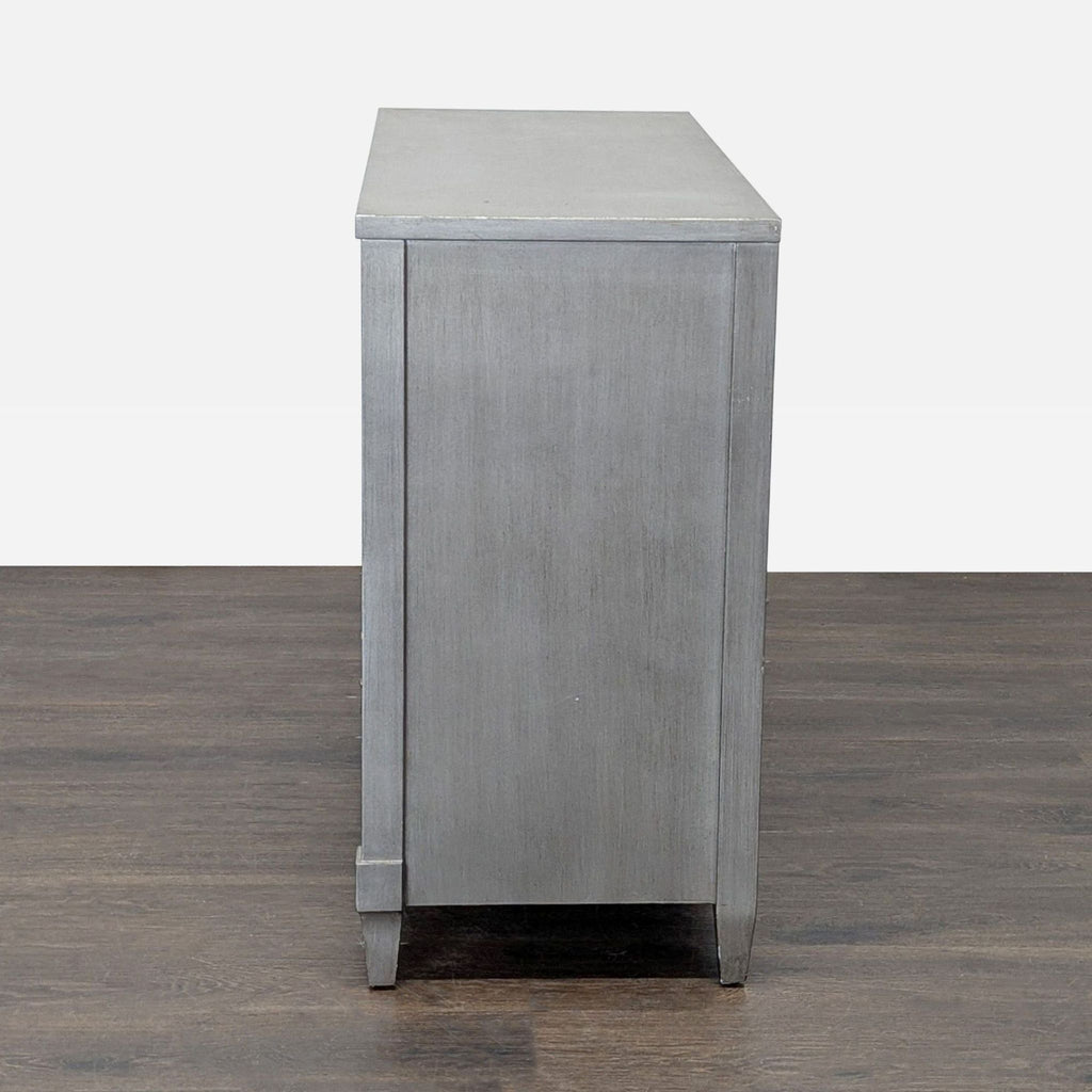 Classic gray dresser featuring spacious drawers, ideal for organizing any room; Restoration Hardware brand.