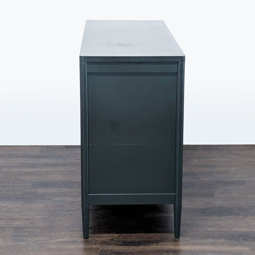 Crate & Barrel six-drawer dresser with clean lines and gold hardware, suited for storing clothes and linens.
