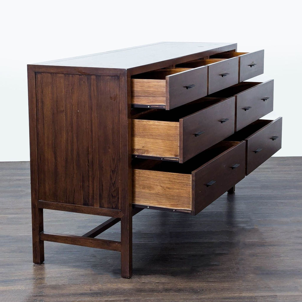 2. Contemporary wood dresser by Room & Board, featuring spacious drawers and minimalist design.