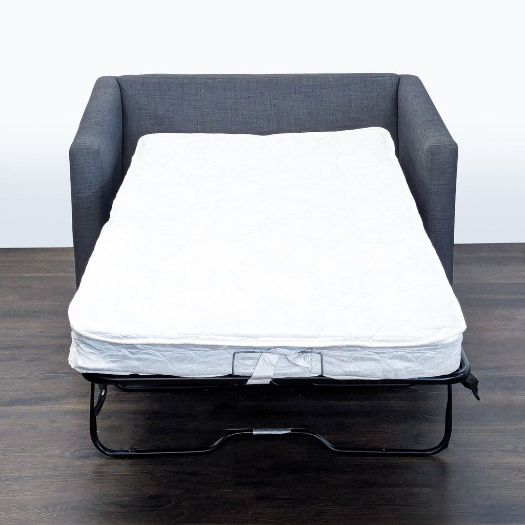 Couch hide-a-bed folded up for reference
Twin hide-a-bed couch in great condition roughly 15 years old. Used very little. 51" wide x 36" deep x 29" tall folded up. 
This is the same CB2 object as below unfolded.