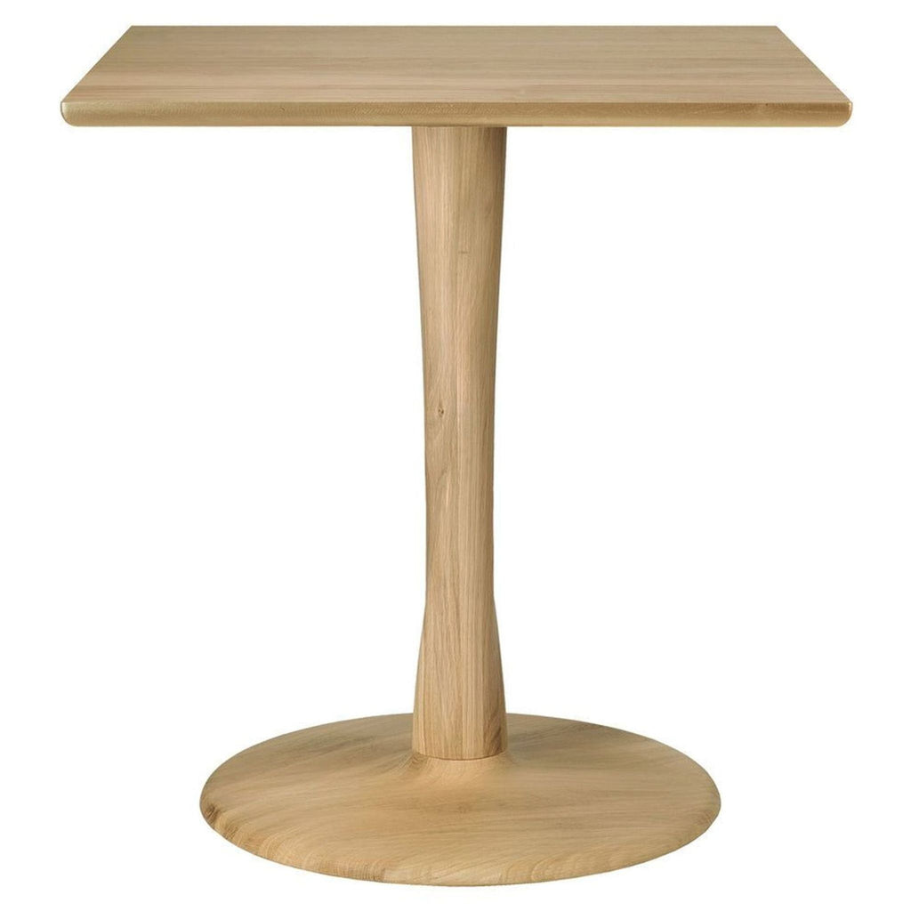 Elegant Torsion table by Ethnicraft, featuring a thin tabletop and a distinctive spiral wooden pedestal.