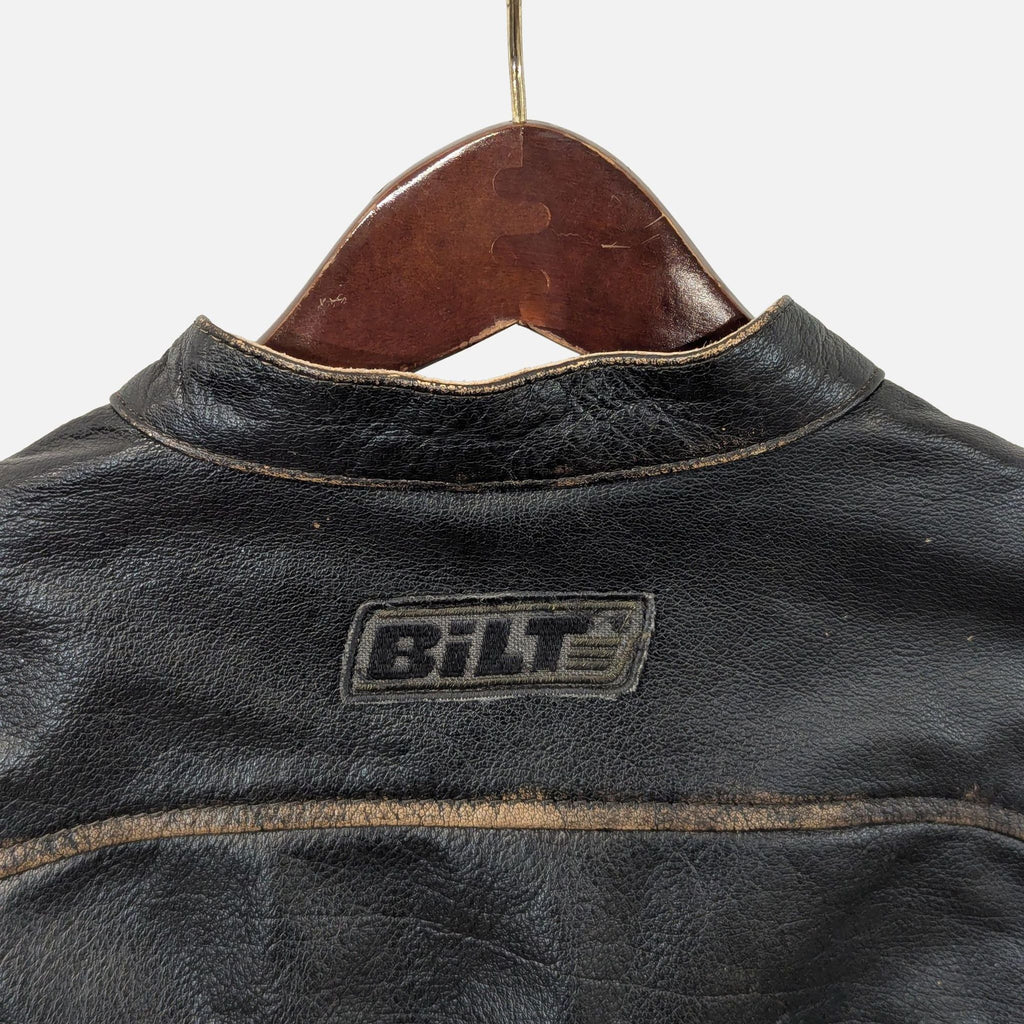 Bilt brand black leather jacket with breathable mesh, quilted styling, and functional zippered storage.
