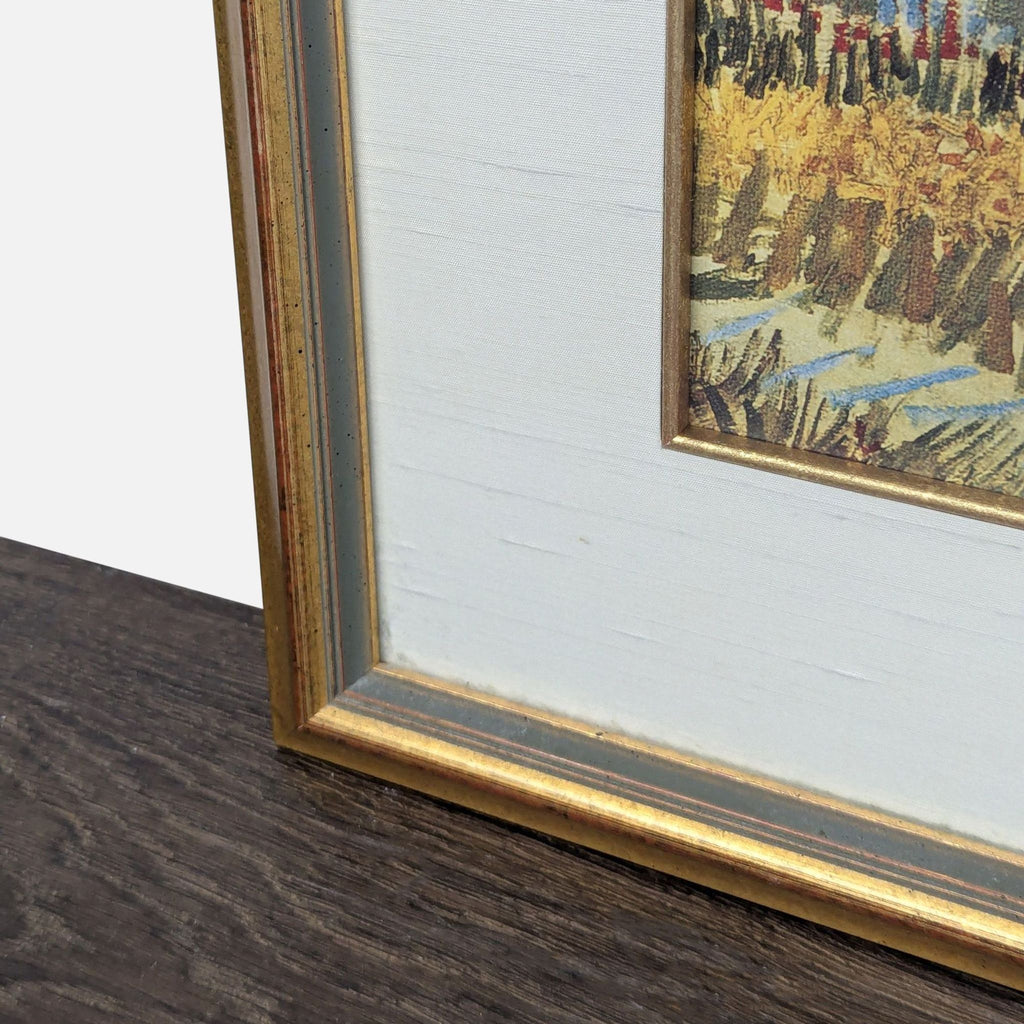 Brightly colored Van Gogh wheat field print with fine detail, displayed in an elegant gold-bordered frame.