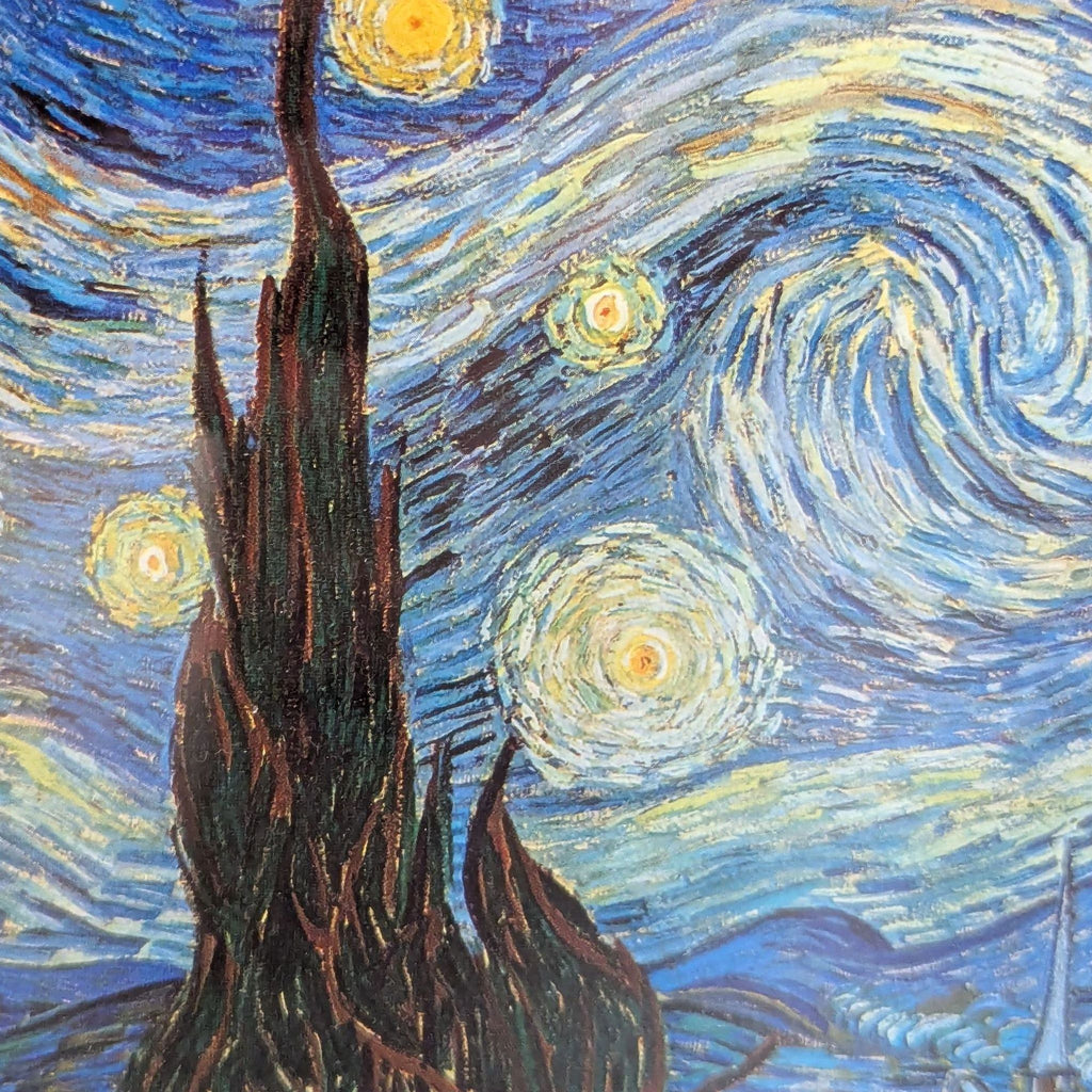 Van Gogh "Starry Night" art print, ready to hang in a gold frame and cream matting.