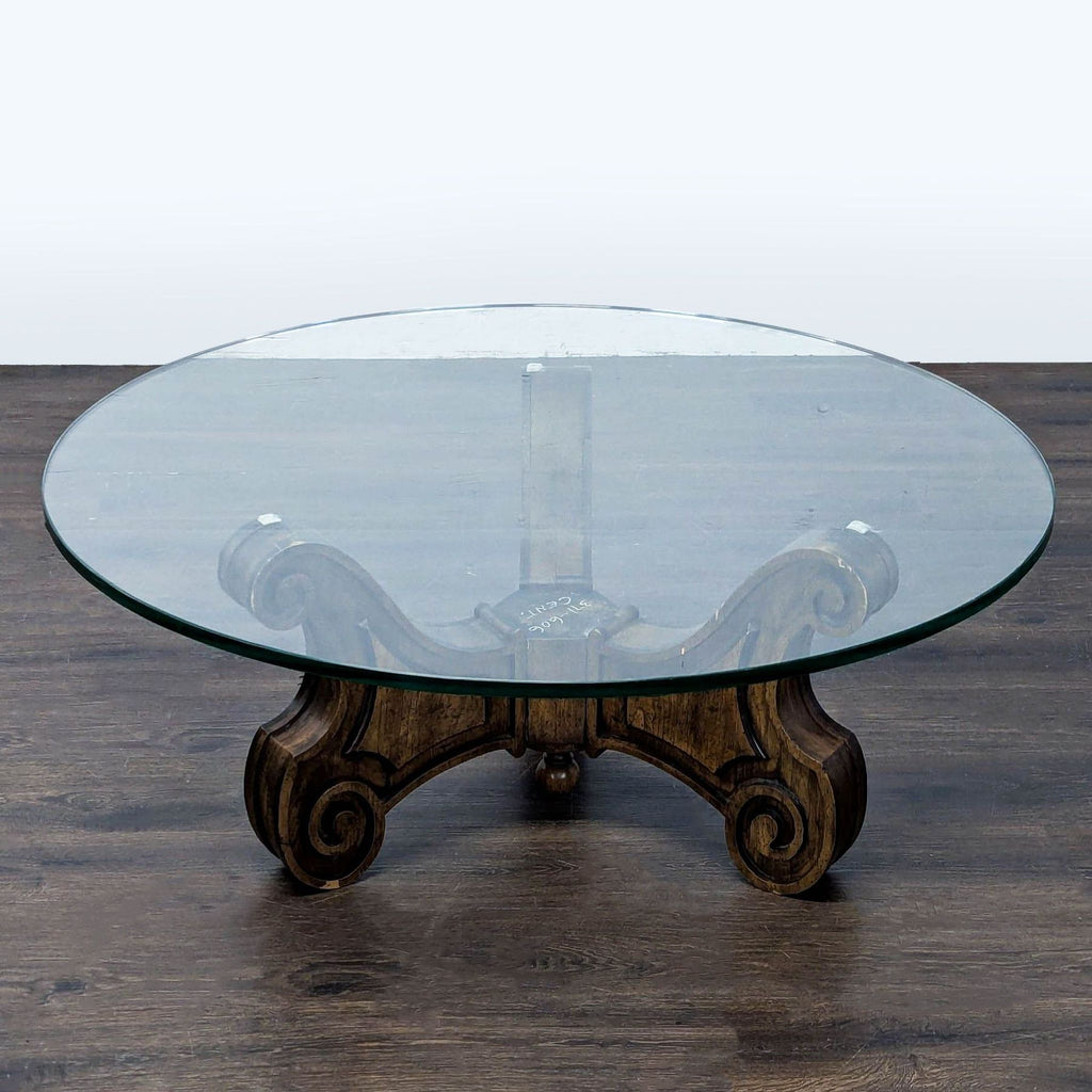 Elegant coffee table with detailed Mediterranean carving on wood base, mid-century style.