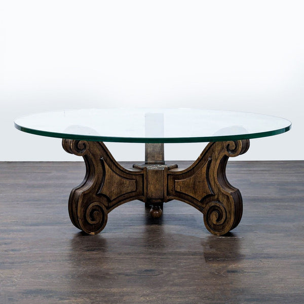 Mid-century coffee table with ornate Mediterranean-style carved wood base.