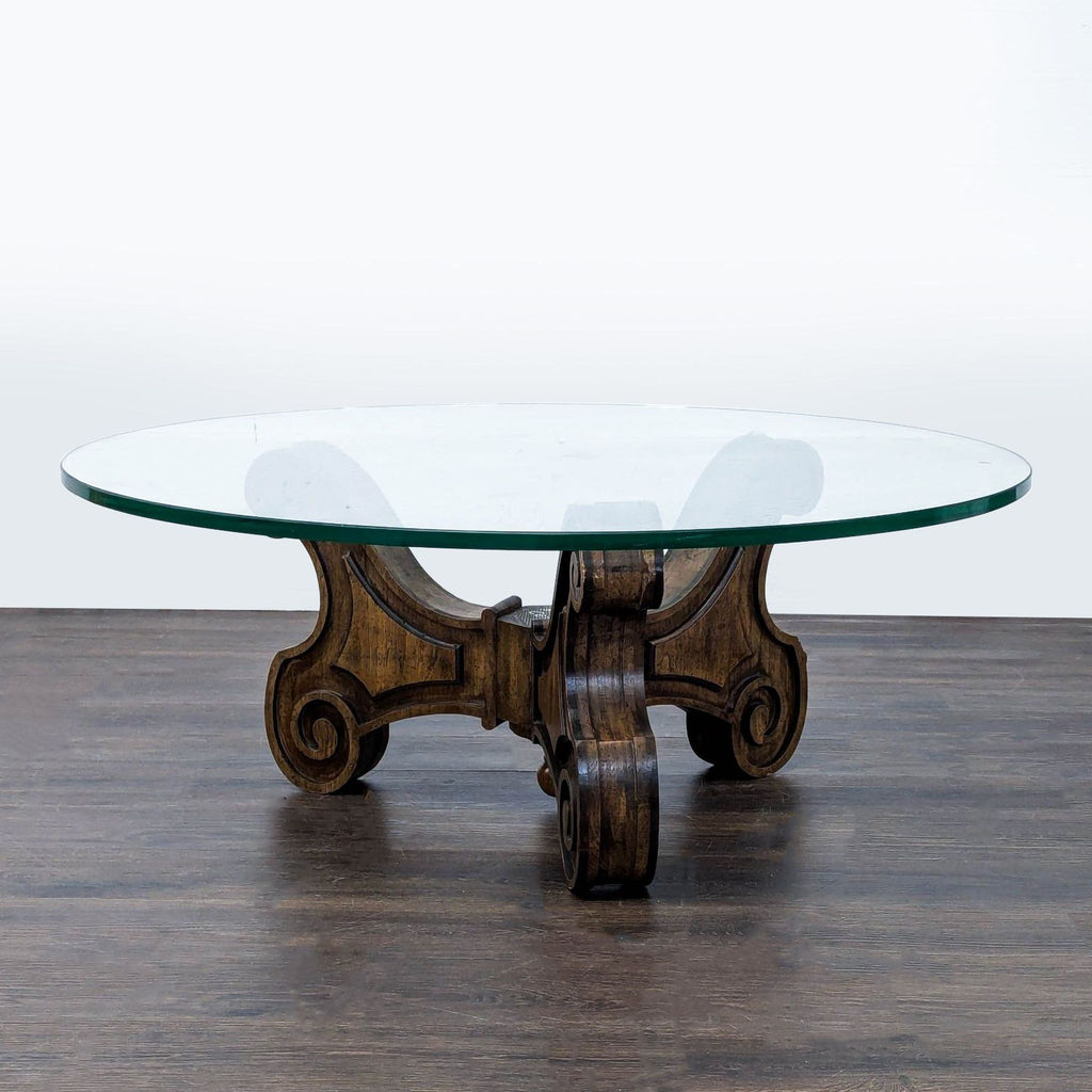 Vintage coffee table featuring a carved wood base and mid-century Mediterranean design.