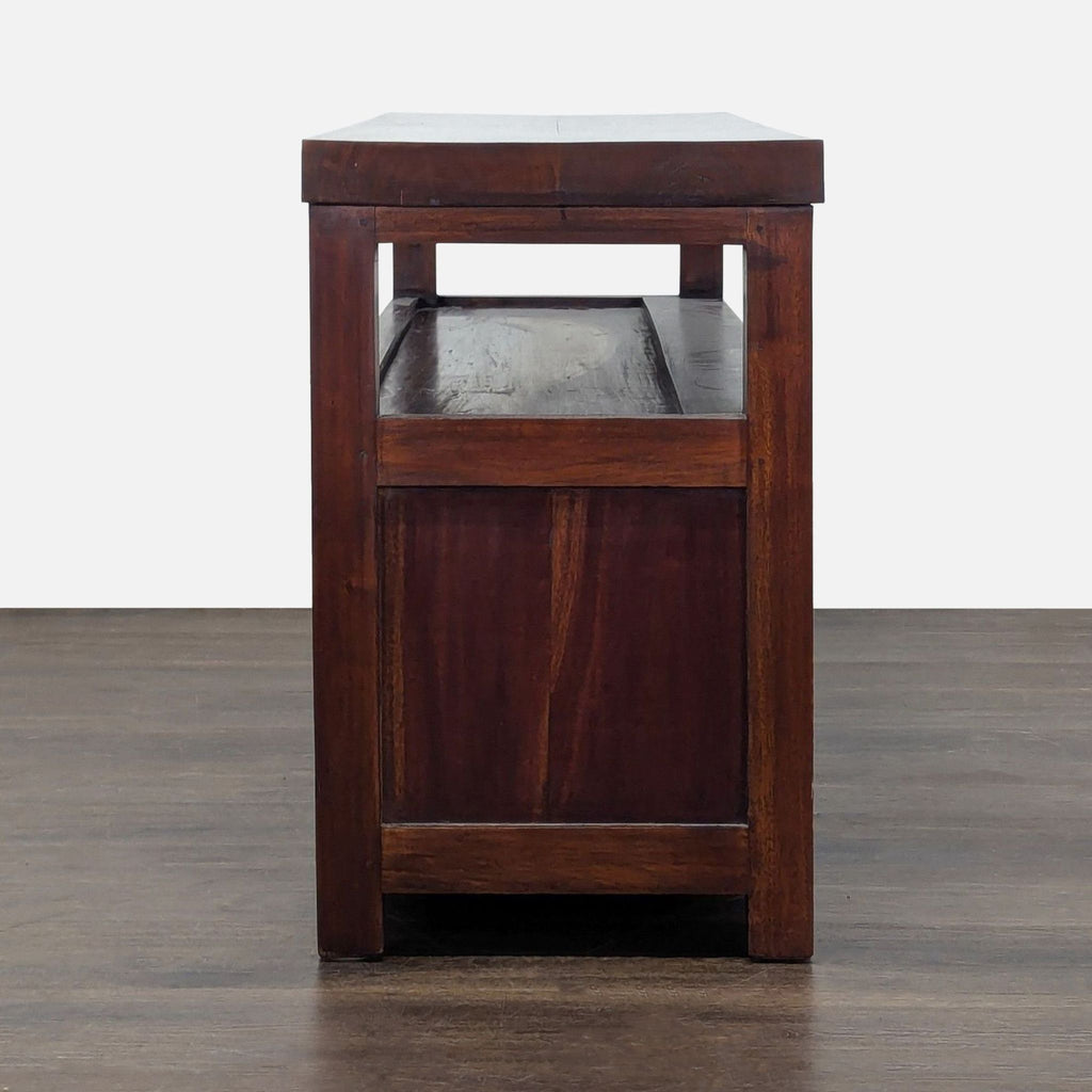 Cabinet in rich dark wood, featuring open shelf for display and bottom sliding doors for extra storage.