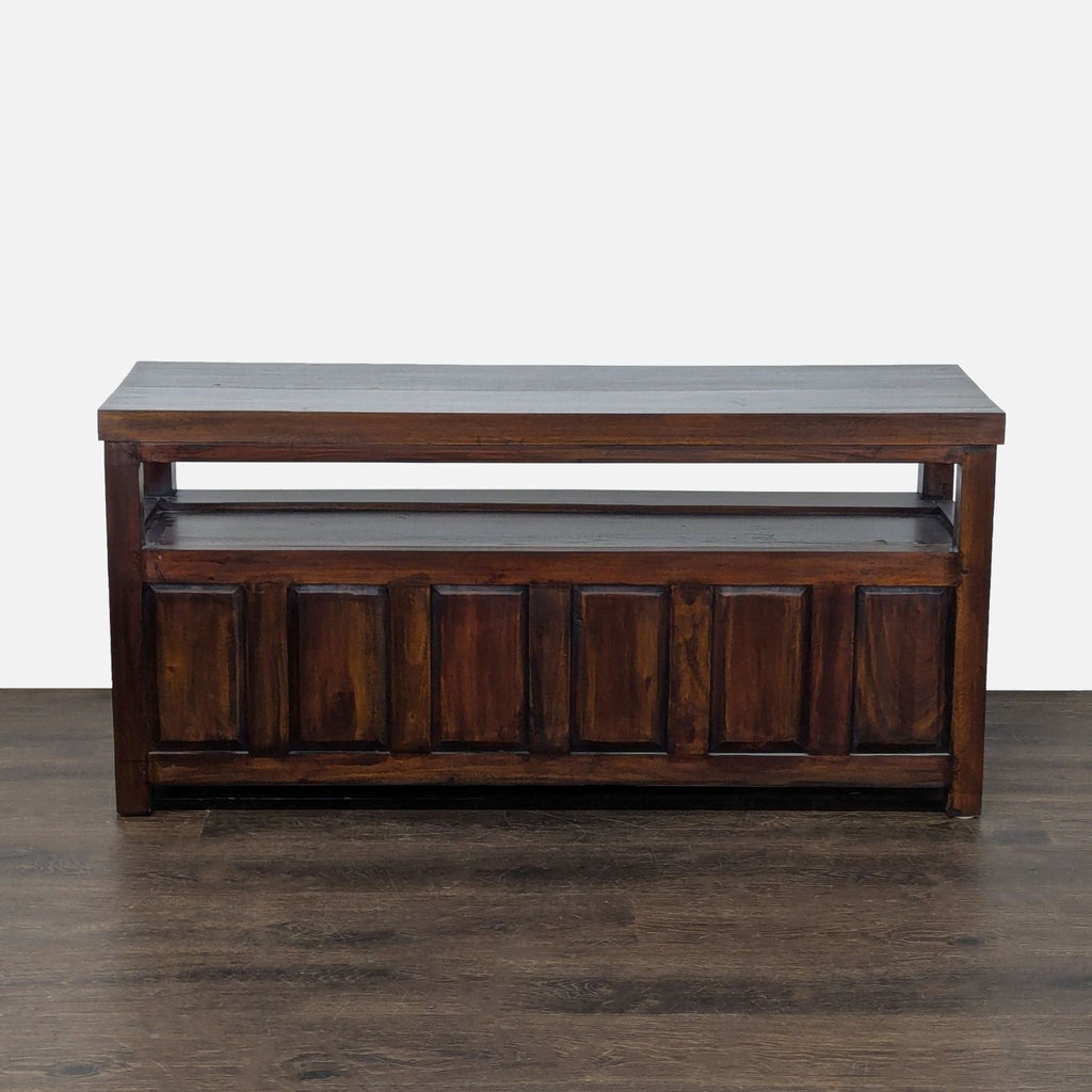 Modern cabinet with dark finish, open display shelf, and lower storage concealed by sliding doors.