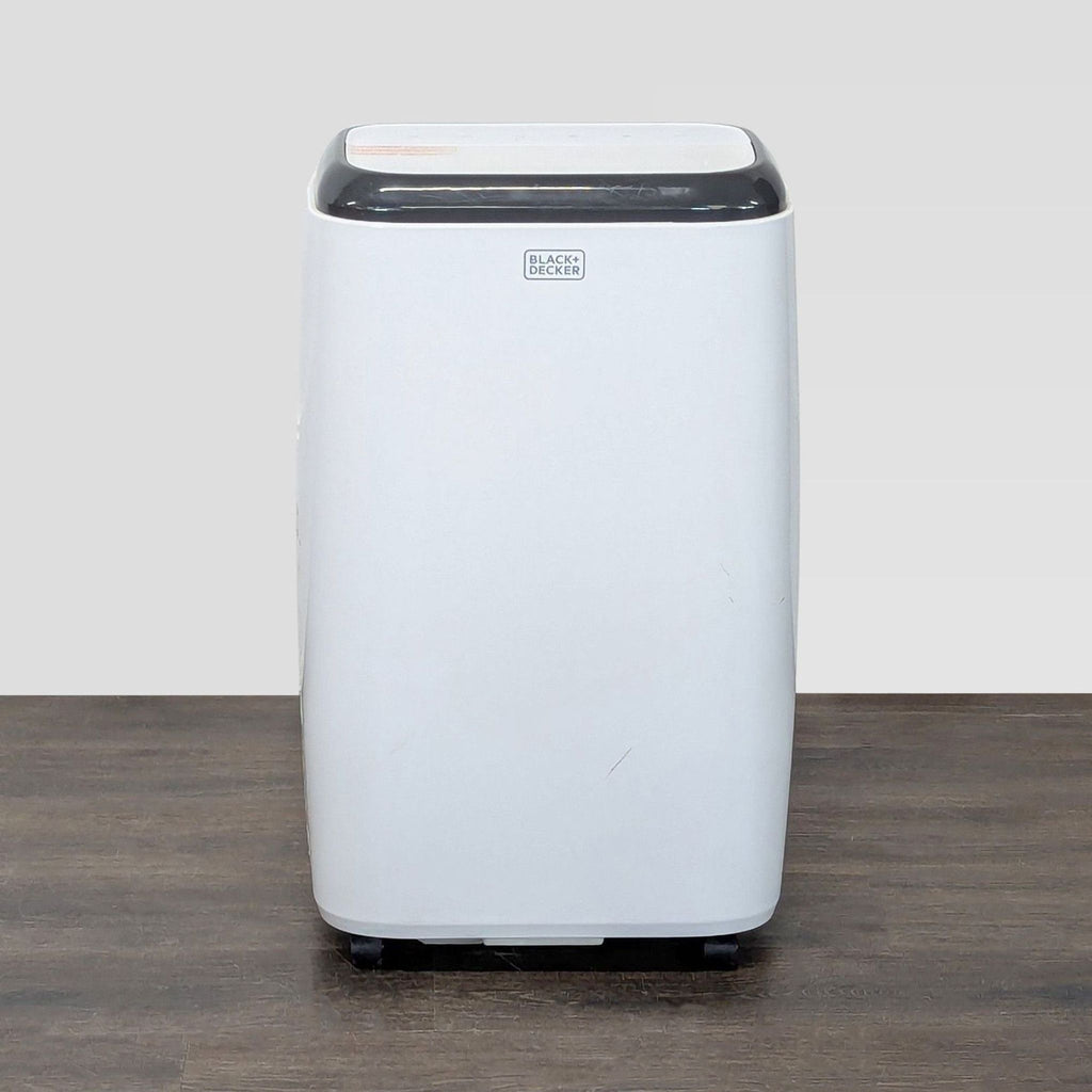 Black + Decker portable air conditioner with a compact, modern design for efficient home or office cooling.  