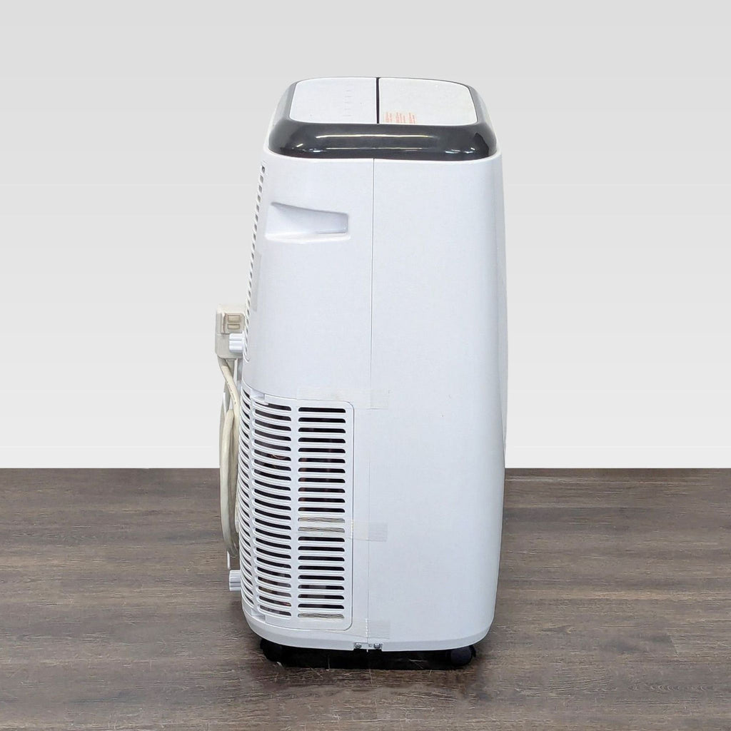 Portable Black + Decker AC unit, ideal for quick cooling, blends with any room’s décor, modern and user-friendly.
