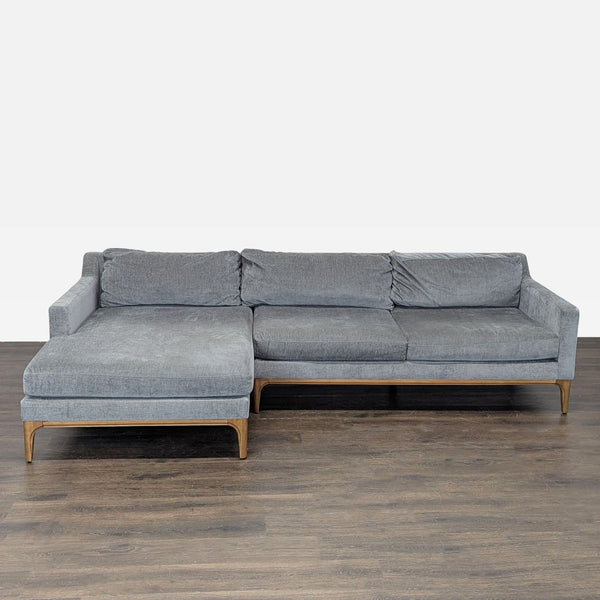West Elm sectional sofa with a soft gray fabric, spacious chaise, and modern clean lines for living rooms.