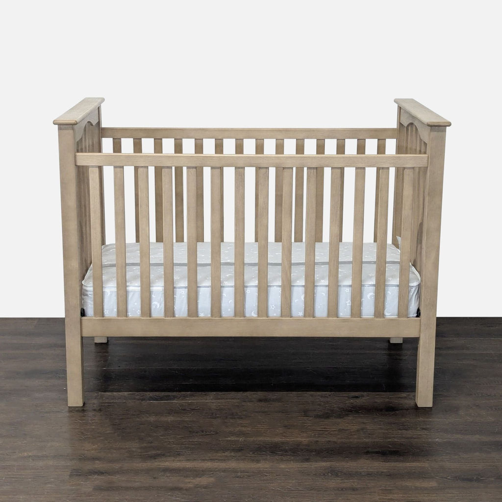Pottery Barn Kids crib with mattress, sturdy wood frame, neutral finish, gently used, perfect for nursery.