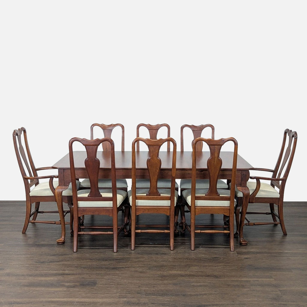 Bob Timberlake cherry dining set with Queen Anne-style table, extension leaves, and eight upholstered chairs.  