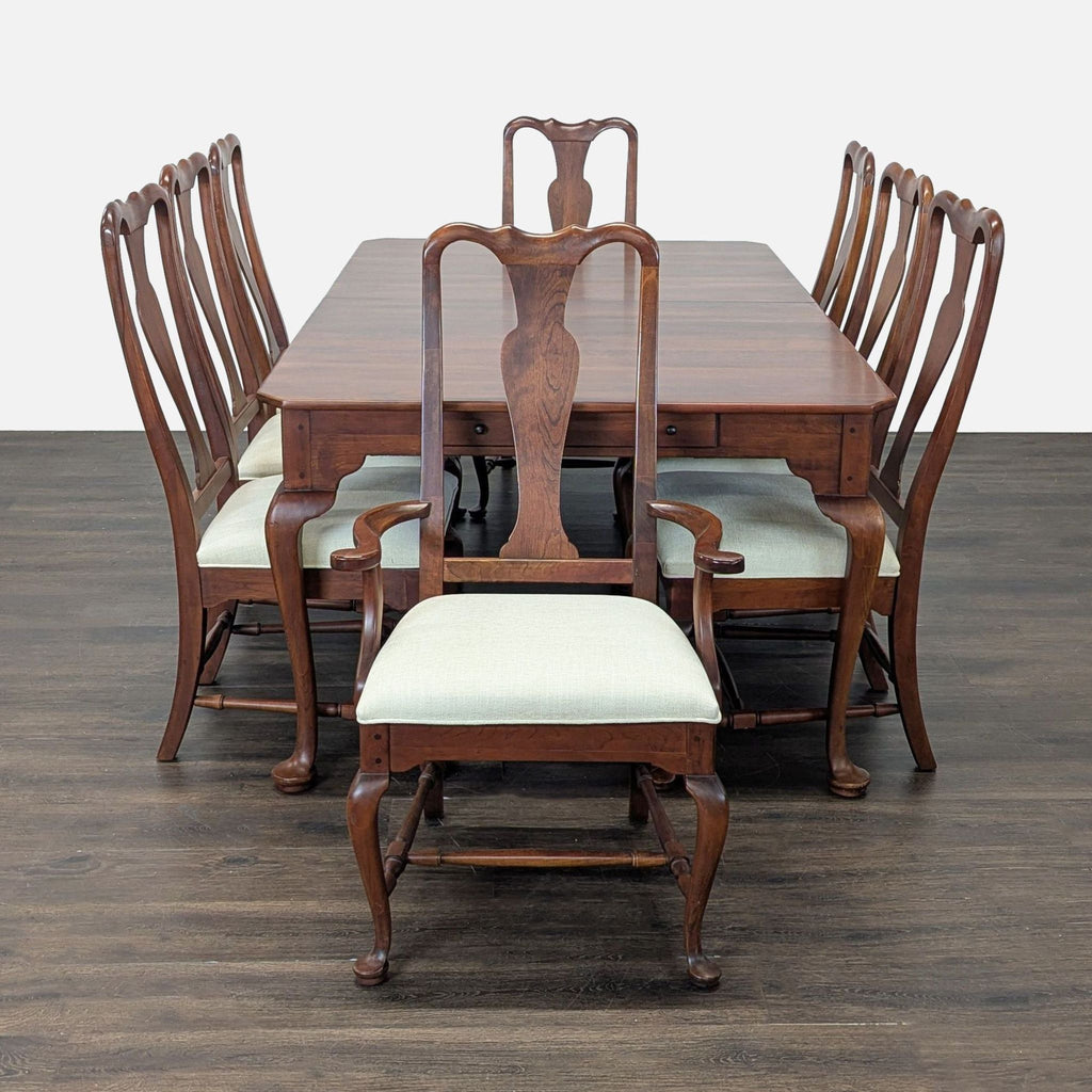 Eight-chair heirloom-quality dining table from Bob Timberlake, includes skirted leaves and dovetailed storage drawers.