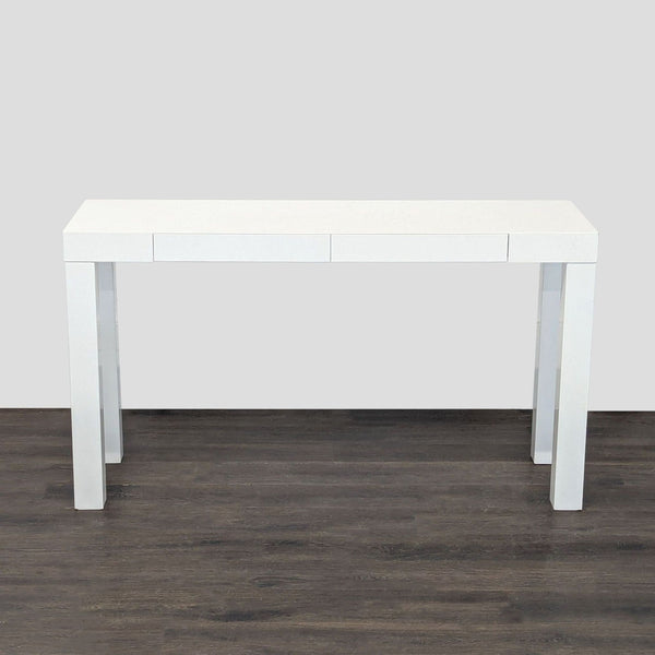 Sleek white lacquer console table from West Elm, perfect for modern hallways or living rooms.