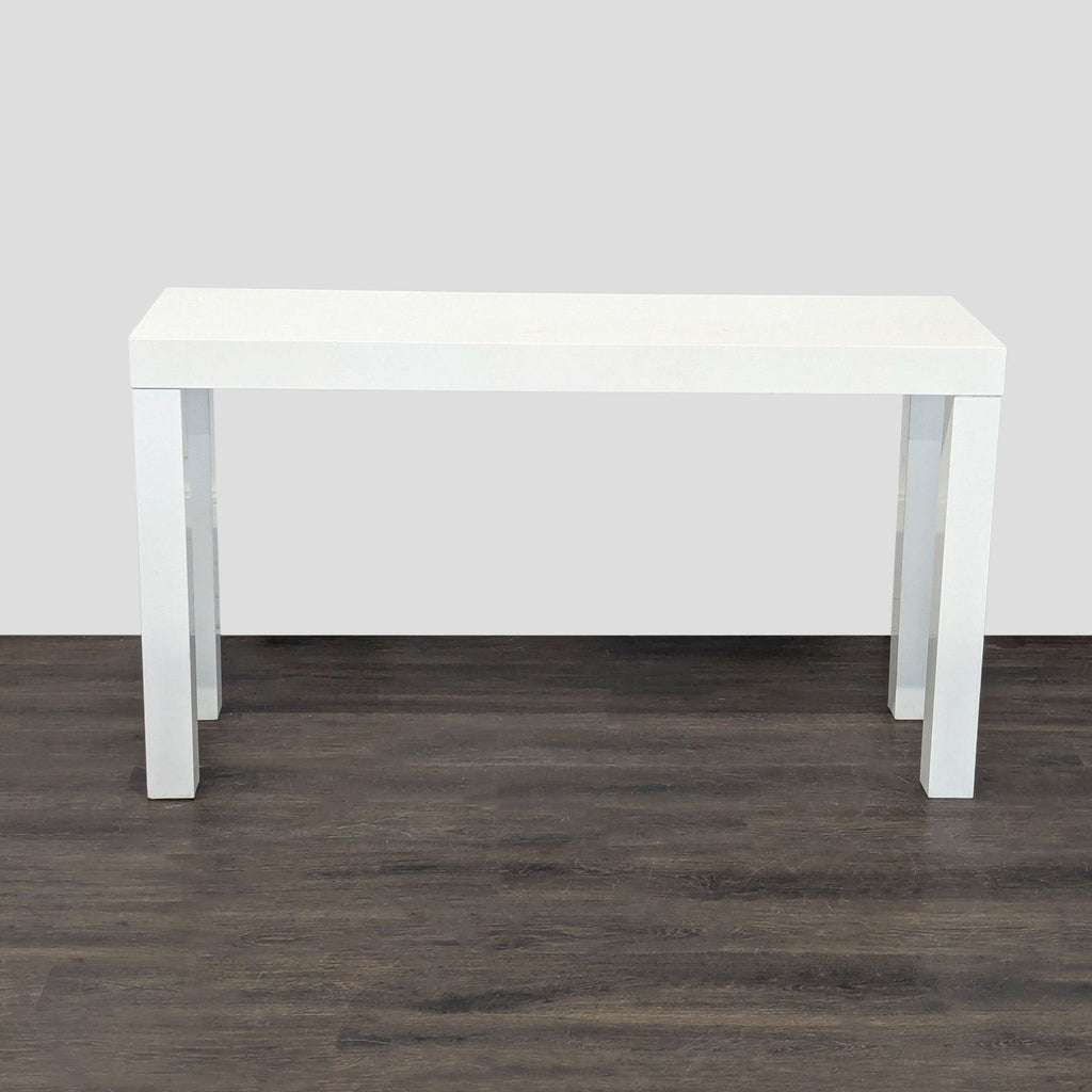 West Elm side and console table in white lacquer, offering a stylish accent for any contemporary space.