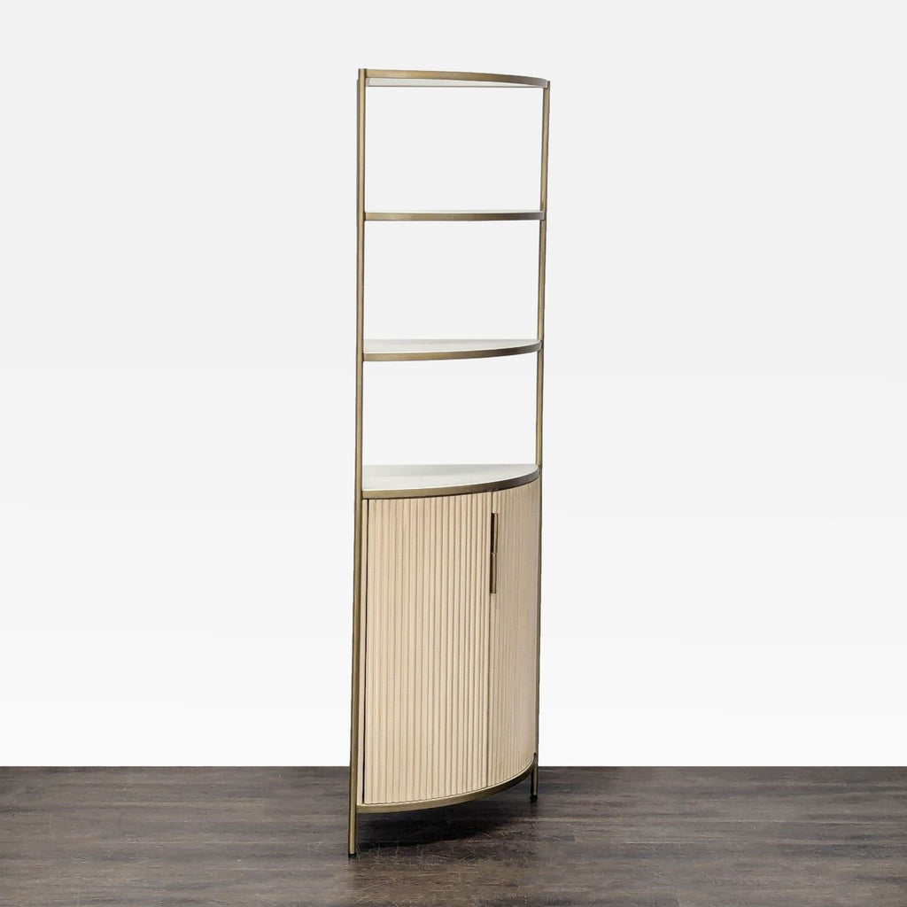 Space-saving bookshelf by Crate & Barrel, combining open display shelves with a concealed storage cabinet below.