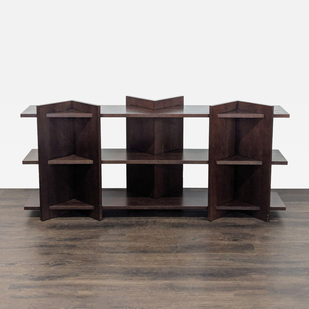 Geometric stained oak veneer console table with angular design and open storage shelves by CB2.