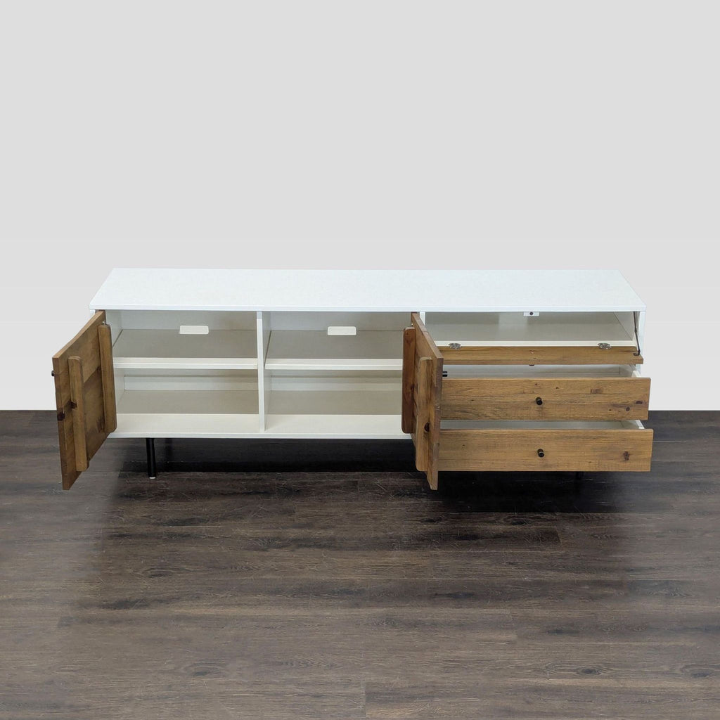 Reclaimed wood entertainment center in Mid-Century style by West Elm with lacquered finish and metal hardware.  