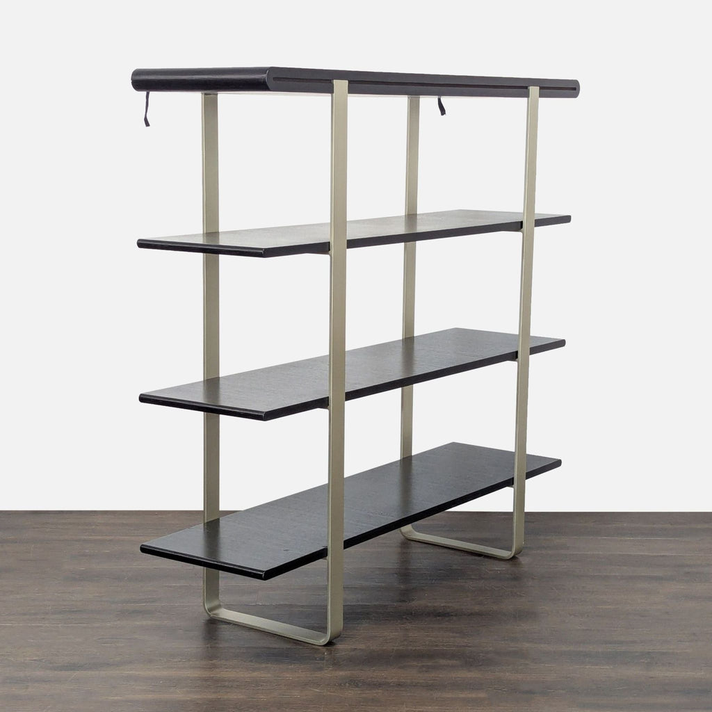 Black four-shelf bookshelf with an open metal frame, designed for compact spaces and versatile storage use.