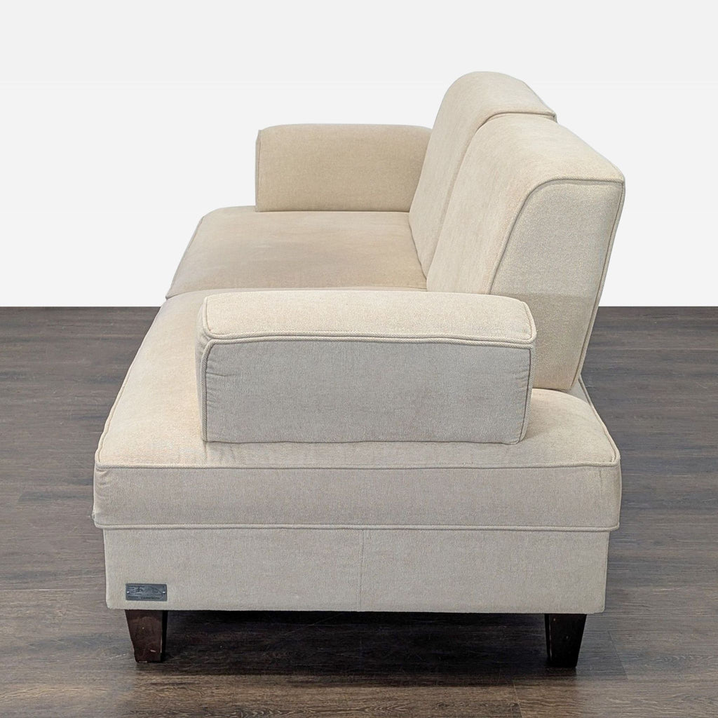 Shermag Canada modern 3-seat sofa in beige with supportive arms, stylish back, and solid wooden base.